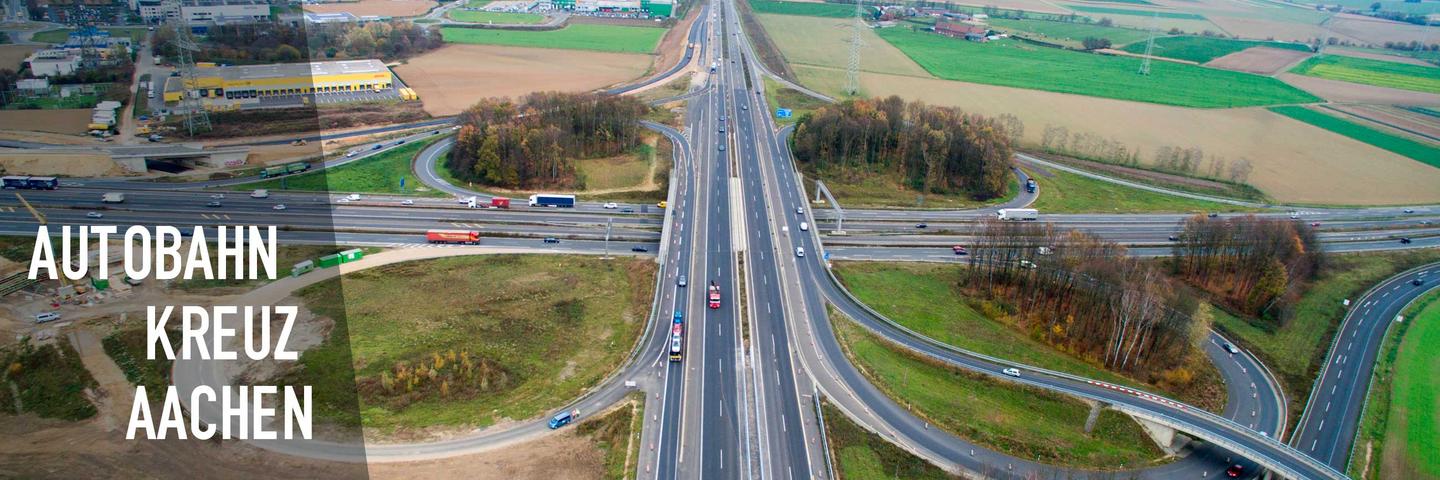 Das Bild zeigt eine Luftaufnahme vom Autobahnkreuz Aachen. - Umbau des Autobahnkreuzes Aachen an der A4, A44 und A544.